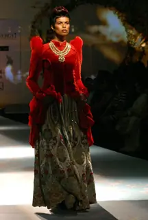 Model walks the ramp for designer Varun Bhal's creation at the Synergy one Delhi Couture Week