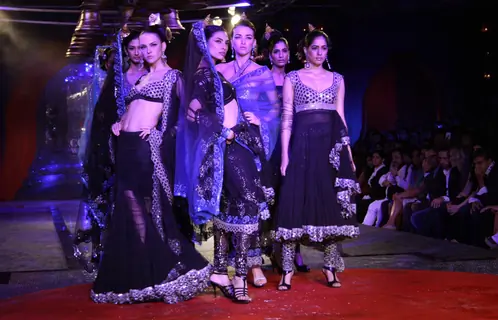 Models showcasing designer Suneet Verma's creations at the Synergy1 Delhi Couture Week,in New Delhi