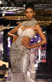 A model showcasing designer Manav Gangwani's creation at the Synergy1 Delhi Couture Week, in New Del