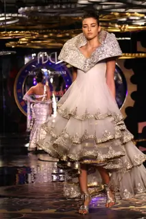 A model showcasing designer Manav Gangwani's creation at the Synergy1 Delhi Couture Week, in New Del