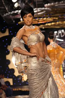 A model showcasing designer Manav Gangwani's creation at the Synergy1 Delhi Couture Week, in New Del