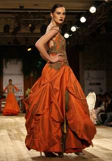 Model showcasing designer Shantanu & Nikhil's creations at Synergy1 Delhi Couture Week,in New Delhi