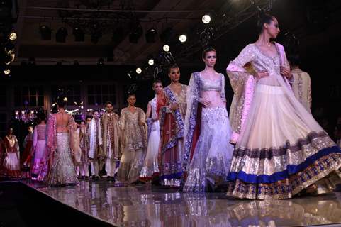 Models showcasing designer Manish Malhotra's creations at Synergy1 Delhi Couture Week,in New Delhi