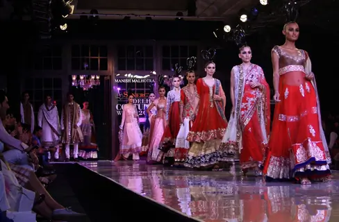 Models showcasing designer Manish Malhotra's creations at Synergy1 Delhi Couture Week,in New Delhi