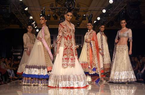 Models showcasing designer Manish Malhotra's creations at Synergy1 Delhi Couture Week,in New Delhi