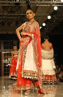 Models showcasing designer Manish Malhotra's creations at Synergy1 Delhi Couture Week,in New Delhi