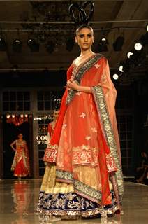 Model showcasing designer Manish Malhotra's creations at Synergy1 Delhi Couture Week,in New Delhi