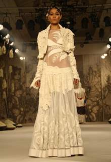 A model showcasing designer Rohit Bal's creation at the Synergy1 Delhi Couture Week,in New Delhi