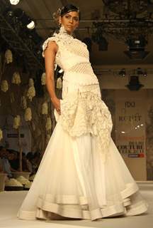 A model showcasing designer Rohit Bal's creation at the Synergy1 Delhi Couture Week,in New Delhi