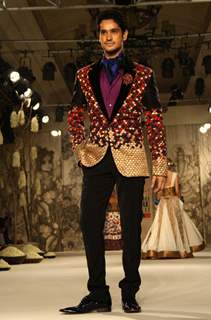 A model showcasing designer Rohit Bal's creation at the Synergy1 Delhi Couture Week,in New Delhi