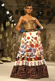 A model showcasing designer Rohit Bal's creation at the Synergy1 Delhi Couture Week,in New Delhi