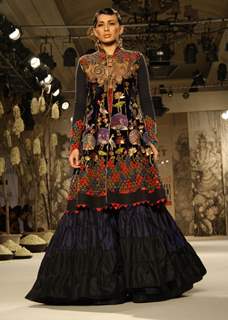 A model showcasing designer Rohit Bal's creation at the Synergy1 Delhi Couture Week,in New Delhi