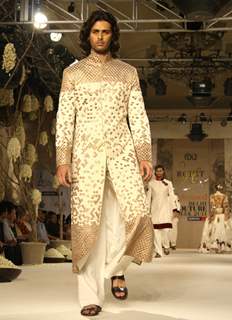 A model showcasing designer Rohit Bal's creation at the Synergy1 Delhi Couture Week,in New Delhi