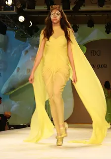 A model showcasing designer Gaurav Gupta's creation at the Synergy1 Delhi Couture Week,in New Delhi