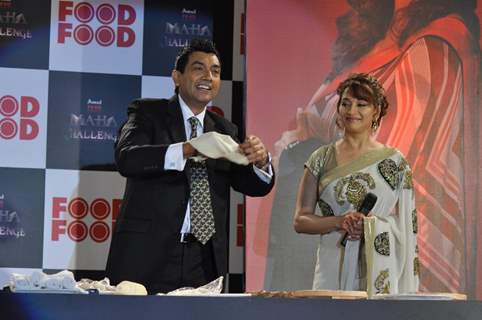 Sanjeev Kapoor with Madhuri Dixit during the announcement of 'Amul FoodFood Mahachallenge' Reality Show in Mumbai