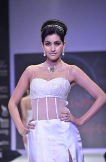 Model walks the ramp for Monica Kapur at IIJW 2011