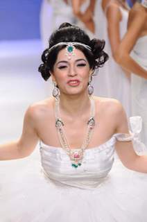 Models walks the ramp for Eekani at IIJW 2011