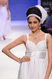 Models walks the ramp for Eekani at IIJW 2011