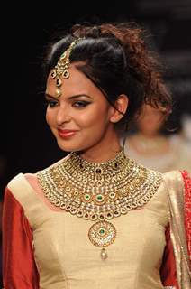 Models walk on the ramp for Manubhai Gems at IIJW 2011 show day 3. .