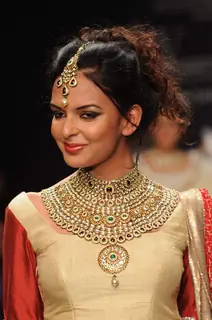 Models walk on the ramp for Manubhai Gems at IIJW 2011 show day 3. .