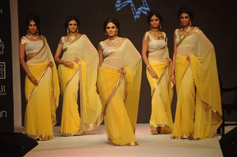 Models walk on the ramp for Manubhai Gems at IIJW 2011 show day 3. .