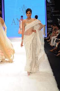 Models walks the ramp for Anmol at IIJW 2011 Day 4. .