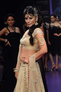Models walks the ramp for Alpana Gujral at IIJW 2011 Day 4. .
