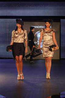 Malaika Arora Khan and Amrita Arora walk the ramp for Mandira Wirk at the Blenders Pride Fashion Tour 2011