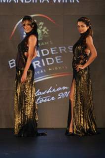 Malaika Arora Khan and Amrita Arora walk the ramp for Mandira Wirk at the Blenders Pride Fashion Tour 2011