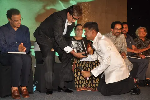 Megastar Amitabh Bachchan unveils Nitin Desai's book at his 25th year celebrations at JW Marriott in Mumbai. .