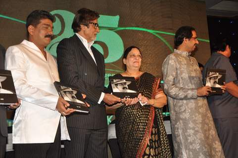 Megastar Amitabh Bachchan unveils Nitin Desai's book at his 25th year celebrations at JW Marriott in Mumbai.  .