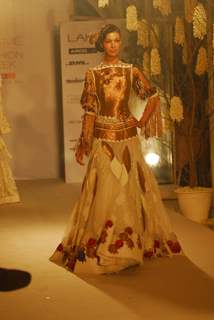 Arjun Rampal walks the ramp for Rohit Bal at Lakme Fashion Week 2011 launch