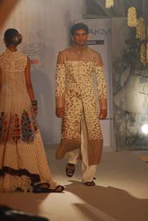 Arjun Rampal walks the ramp for Rohit Bal at Lakme Fashion Week 2011 launch