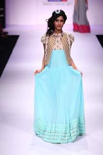 Model displays designer VJ Balhara's creation during the Lakme Fashion Week Day 3 in Mumbai. .