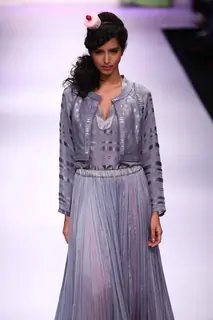 Model displays designer VJ Balhara's creation during the Lakme Fashion Week Day 3 in Mumbai. .