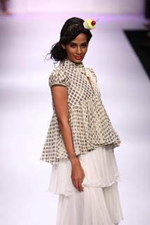 Model displays designer VJ Balhara's creation during the Lakme Fashion Week Day 3 in Mumbai. .