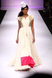 Model displays designer VJ Balhara's creation during the Lakme Fashion Week Day 3 in Mumbai. .