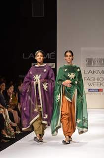 Models display creations by designer Sabyasachi during Lakme Fashion Week Day 3 in Mumbai. .