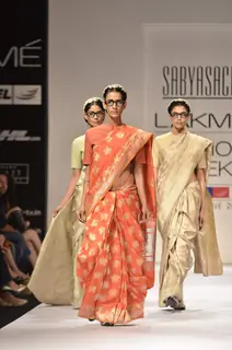 Models display creations by designer Sabyasachi during Lakme Fashion Week Day 3 in Mumbai. .