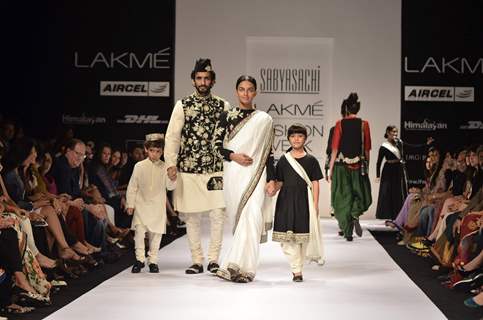 Models display creations by designer Sabyasachi during Lakme Fashion Week Day 3 in Mumbai. .