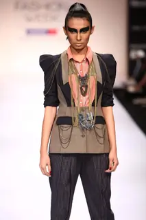 Model display creations by designer Ruchika Sachdeva during Lakme Fashion Week Day 3 in Mumbai. .