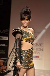 Model displays designer Pria Kataria Puri's creation during the Lakme Fashion Week Day 3 in Mumbai. .