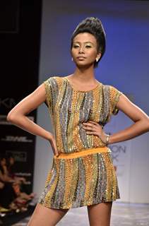 Model displays designer Pria Kataria Puri's creation during the Lakme Fashion Week Day 3 in Mumbai. .