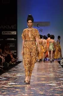 Model displays designer Pria Kataria Puri's creation during the Lakme Fashion Week Day 3 in Mumbai. .