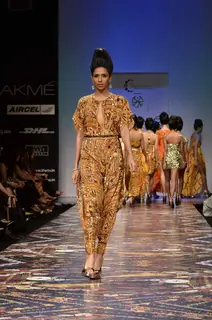 Model displays designer Pria Kataria Puri's creation during the Lakme Fashion Week Day 3 in Mumbai. .