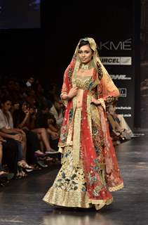 Model displays designer Neeta Lulla's creation during the Lakme Fashion Week Day 4 in Mumbai. .