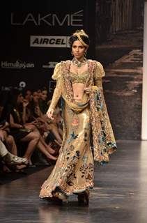 Model displays designer Neeta Lulla's creation during the Lakme Fashion Week Day 4 in Mumbai. .