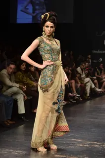 Model displays designer Neeta Lulla's creation during the Lakme Fashion Week Day 4 in Mumbai. .
