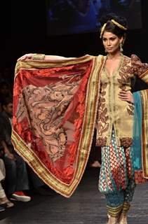 Model displays designer Neeta Lulla's creation during the Lakme Fashion Week Day 4 in Mumbai. .