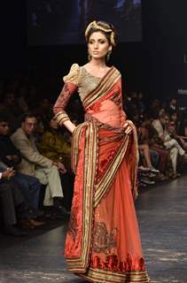 Model displays designer Neeta Lulla's creation during the Lakme Fashion Week Day 4 in Mumbai. .